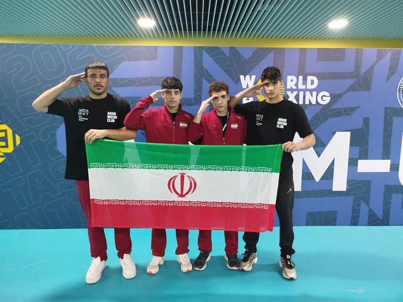 سلام نظامی مدال‌آور همدانی تیم‌ملی بوکس با پرچم مقدس ایران در قلب تاشکند